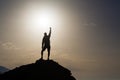 Success with arms outstretched celebrate mountains sunrise Royalty Free Stock Photo
