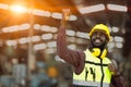 Success black African male worker raised his fist in happy joyful. congratulate enjoy working and receive good welfare concept
