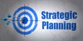 Business concept: target and Strategic Planning on wall background Royalty Free Stock Photo