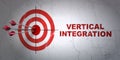 Business concept: target and Vertical Integration on wall background