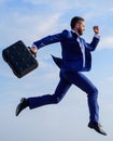 Success in business demands supernatural efforts from entrepreneur personality. Businessman with briefcase jump high