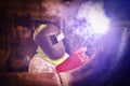 worker welding in factory