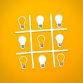 Success concept, light bulb on ox game on yellow background