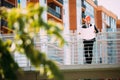 Success Engineer wear white helmet for safety and checking building plans blue print. Royalty Free Stock Photo