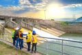 The success of the engineering team together develop water power in the dam to generate electricity Royalty Free Stock Photo