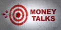 Finance concept: target and Money Talks on wall background