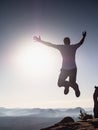 Success and freedom. The independence concept photo. Hiker jumps