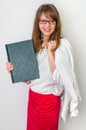 Success graduate woman with her thesis work on white Royalty Free Stock Photo