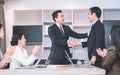Success and happiness teamwork concept, Businessman handshake finishing up a meeting business partnership after good deal