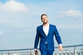 Success his second name. Businessman successful entrepreneur in suit walks outdoor sunny day sky background. Man Royalty Free Stock Photo