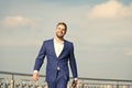 Success his second name. Businessman successful entrepreneur in suit walks outdoor sunny day sky background. Man Royalty Free Stock Photo