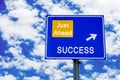 Success Just Ahead Blue Road Sign Against Blue Cloudy Sky Royalty Free Stock Photo