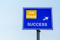 Success Just Ahead Blue Road Sign Against sky Royalty Free Stock Photo