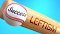 Success in life depends on leftism - pictured as word leftism on a bat, to show that leftism is crucial for successful business or Royalty Free Stock Photo