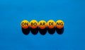 Success onboarding process symbol. Orange table tennis balls on blue background, copy space. Word `onboarding`. Business and