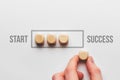 Success path concept with wooden cubes loading bar