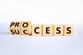 Success process symbol. Turned wooden cubes and changed the word `success` to `process`. Beautiful white background, copy spac Royalty Free Stock Photo