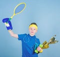 Success in sport. Succeed in everything. Athlete successful boy sport equipment jump rope boxing glove tennis racket Royalty Free Stock Photo