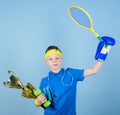 Success in sport. Succeed in everything. Athlete successful boy sport equipment jump rope boxing glove tennis racket Royalty Free Stock Photo