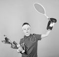 Success in sport. Succeed in everything. Athlete successful boy sport equipment jump rope boxing glove tennis racket Royalty Free Stock Photo