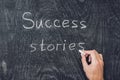 Success stories written on the blackboard using chalk Royalty Free Stock Photo