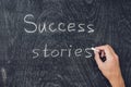 Success stories written on the blackboard using chalk Royalty Free Stock Photo