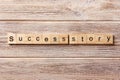 Success story word written on wood block. Success story text on table, concept Royalty Free Stock Photo