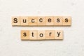 Success story word written on wood block. Success story text on table, concept Royalty Free Stock Photo