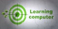 Studying concept: target and Learning Computer on wall background