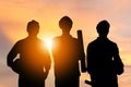 Success and Teamwork Concept, Silhouette of engineer and worker team with clipping path standing with sunset background