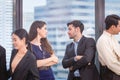 Success and Teamwork concepts, Group of young business people team chatting after the meeting Royalty Free Stock Photo