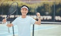 Success, tennis court and winner portrait of man with excited fist after athletic match. Victory, achievement and Royalty Free Stock Photo