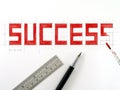 word success, watercolor painting on lettering sketch in grid scale with stationery Royalty Free Stock Photo