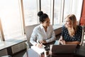 Success will inevitably be ours. two businesswomen working together on a laptop in an office. Royalty Free Stock Photo