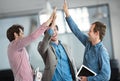 Success, winners or excited business people high five after a winning a deal or group partnership achievement. Teamwork Royalty Free Stock Photo