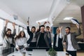 Success and winning concept happy business team celebrating victory in office Royalty Free Stock Photo