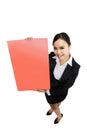 Success woman holding red board shoot in high and wide angle vie Royalty Free Stock Photo