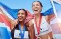Success, women and running team with a flag in celebration of winners medals achievement at a sports event. Fitness Royalty Free Stock Photo