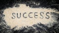 Success word written on white sand Royalty Free Stock Photo