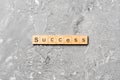 Success word written on wood block. Success text on table, concept Royalty Free Stock Photo