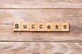 Success word written on wood block. success text on wooden table for your desing, concept Royalty Free Stock Photo