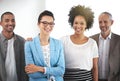 Success is written all over their faces. Portrait of a group of positive coworkers standing in an office.