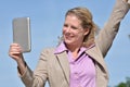 Successful Adult Blonde Business Woman Wearing Suit With Tablet Royalty Free Stock Photo