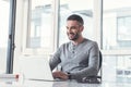 Successful adult man is looking at screen of modern gadget Royalty Free Stock Photo