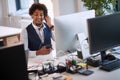 Successful african american businessman holding mobile phone call. Young business people in office Royalty Free Stock Photo