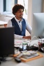 Successful african american businessman working on computer.Modern high tech office Royalty Free Stock Photo