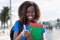 Successful african american female student showing thumb Royalty Free Stock Photo