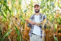 successful agriculturist in field of corn Royalty Free Stock Photo