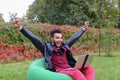 Successful Arabic Young Businessman Sits With Laptop in Chair, S Royalty Free Stock Photo