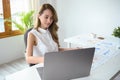 Successful Asian businesswoman or female financial manager working at her office desk Royalty Free Stock Photo